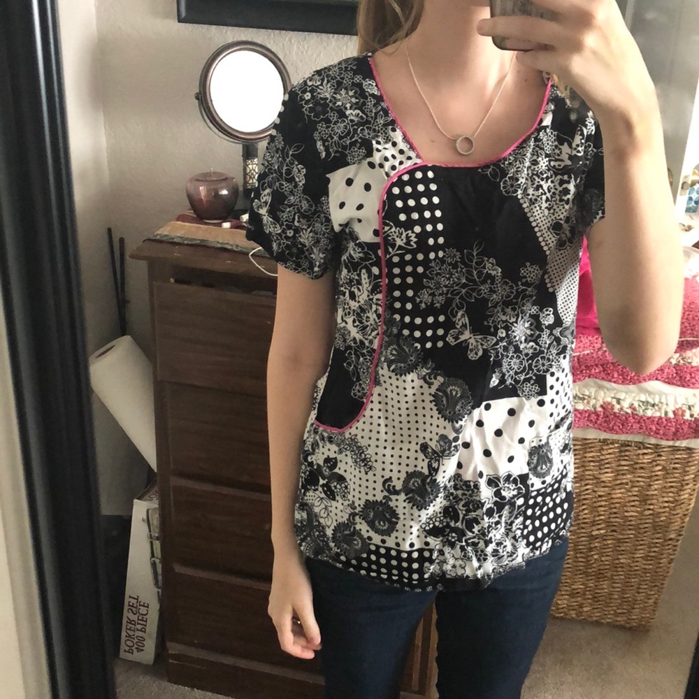 Pink black and white scrub top